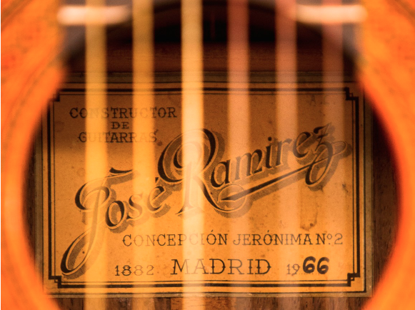 Close up image of a guitar.