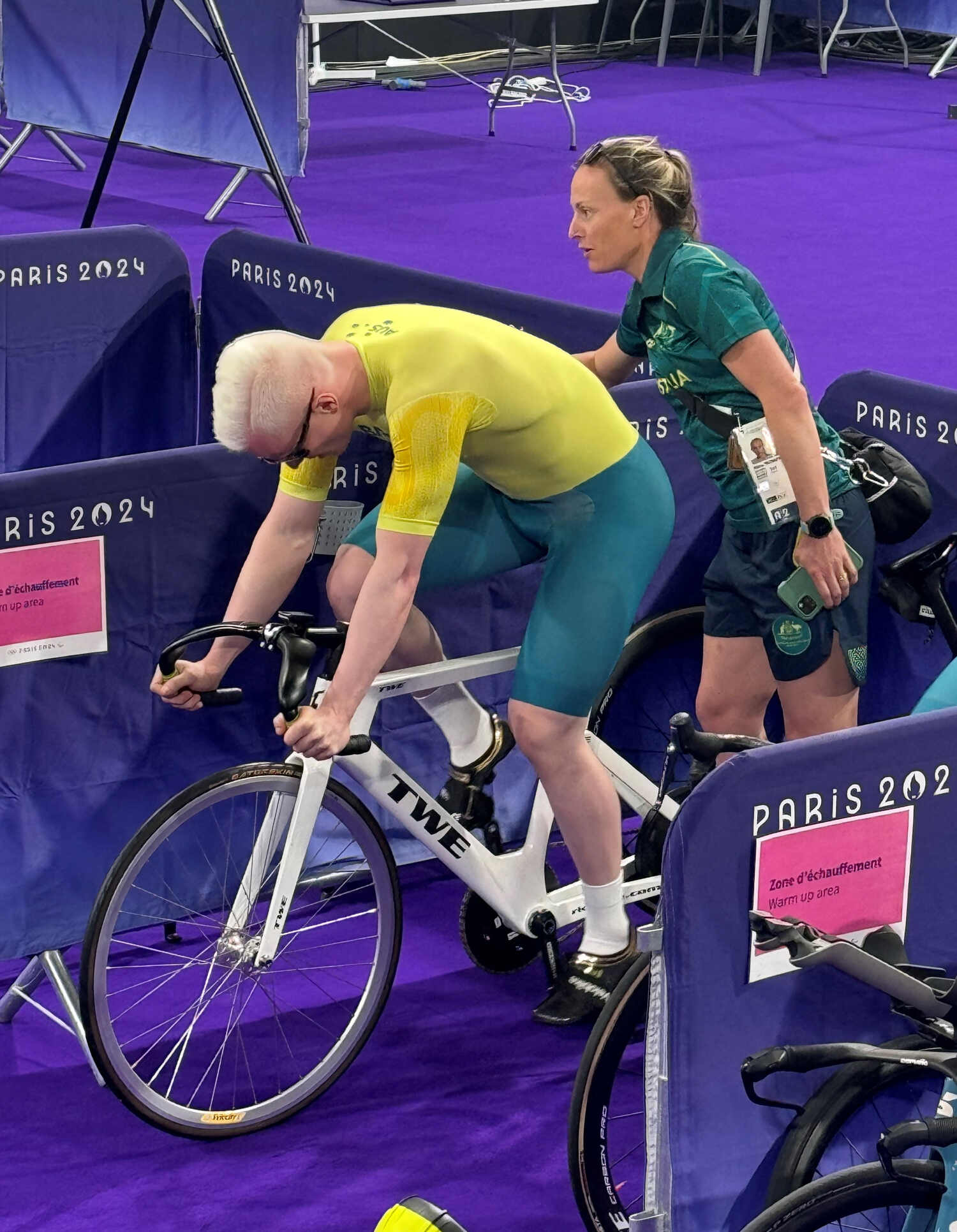 Alice McNamara with Para-cycling athlete Kane Perris at the 2024 Paris Paralympics.