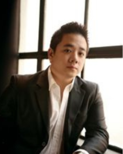 A headshot of Eric Chung.