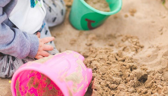 Child playing in sand