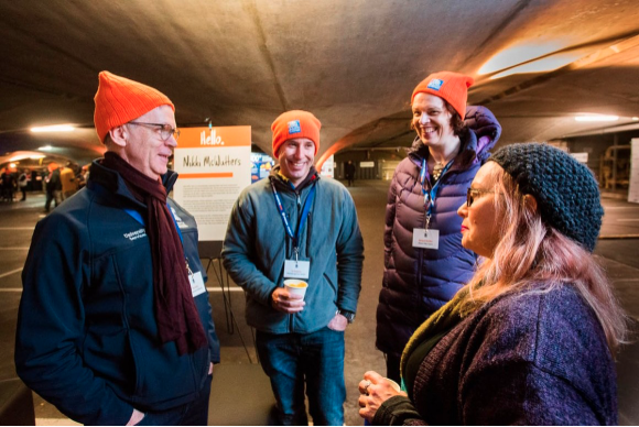 Image of Head of University Services Paul Duldig with business and community leaders in the University of Melbourne's underground car park.
