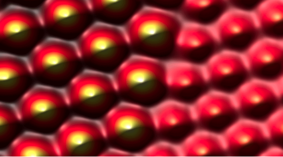 Atomically-resolved image of two noble gas monolayers.