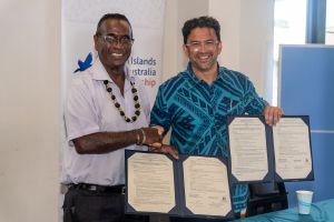 The signing of the new partnership between Solomon Islands National University, Vice-Chancellor Dr Transform Aqorau (left) and University of Melbourne, Deputy Vice-Chancellor (Global, Culture and Engagement) Professor Michael Wesley (right). Image credit: Jason Gagame