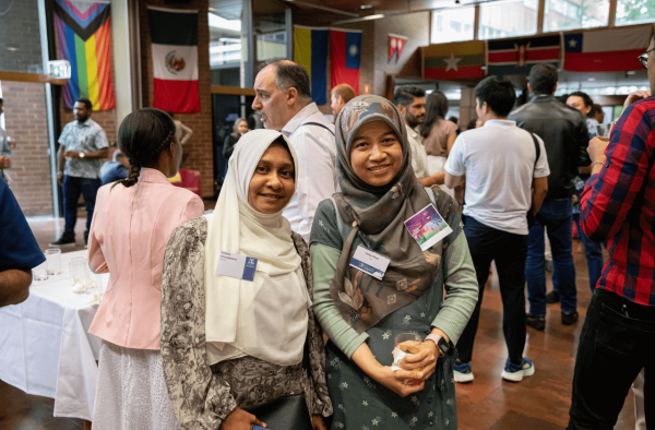 A student and alumni volunteer pair at a Welcome to Melbourne launch event.
