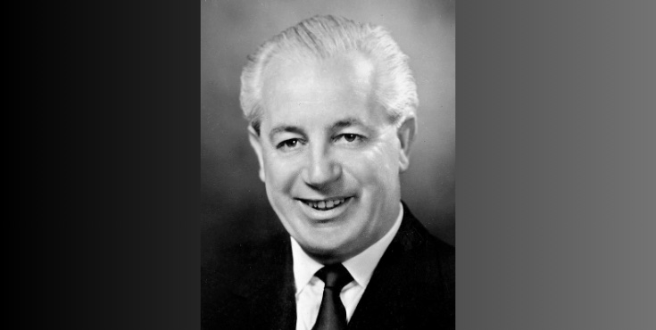 A black and white studio photograph of Harold Holt.