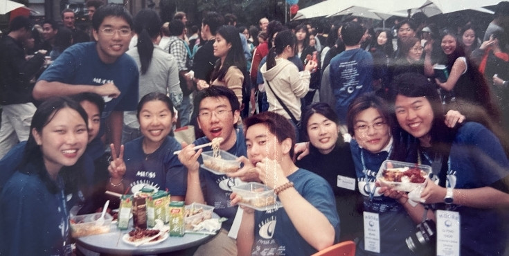 A group of friends eating at a table