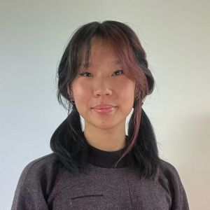 Image for A woman facing the camera smiling