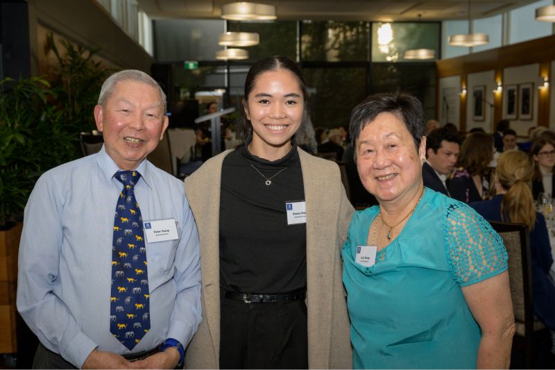 Peter and Judy meeting 2022 Peter Yeung Dental Scholarship recipient, Swezie Bitalac, at the Melbourne Medical School Celebration Dinner.