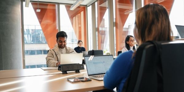 Professional working at Melbourne Connect co-working space