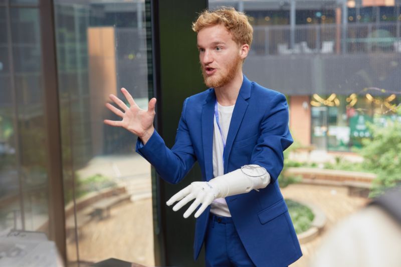 Man presenting research in casual setting