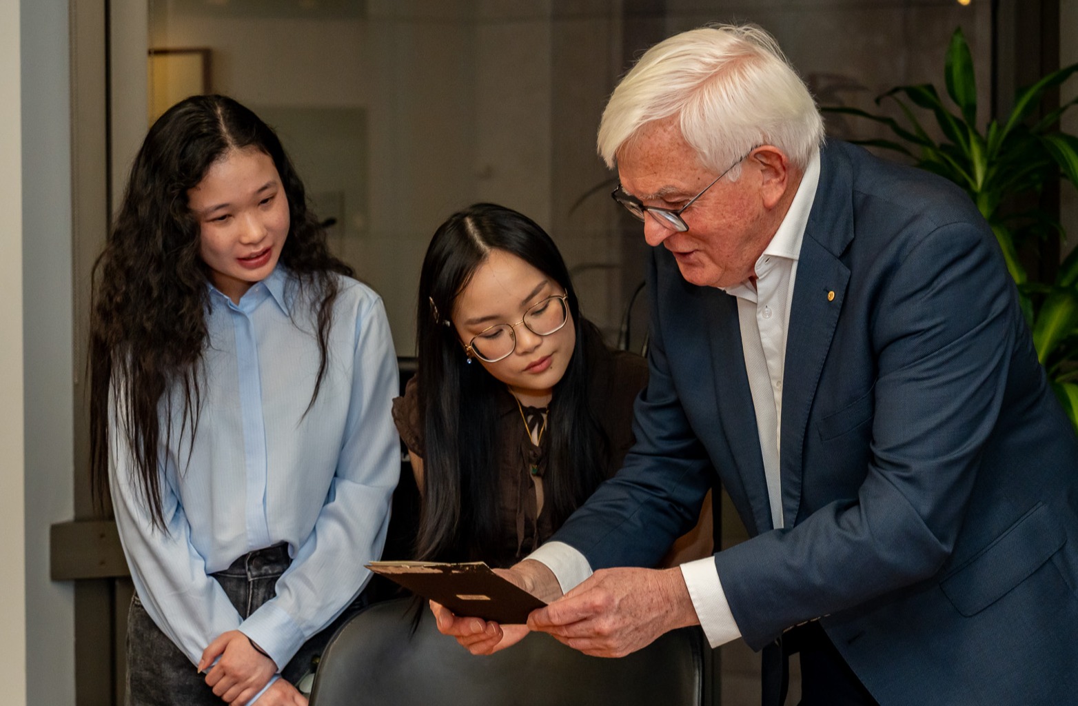 L-R: Emily and Queenie Sheng, Bachelor of Arts Narrm Scholars; John Mooney, Director and Trustee, Eugene Marthe & Pierre Gorman Foundation. L-R: Emily and Queenie Sheng, Bachelor of Arts Narrm Scholars; John Mooney, Director and Trustee, Eugene Marthe & Pierre Gorman Foundation.