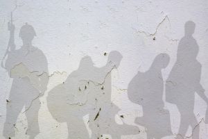 A stock image of a silhouette of people.