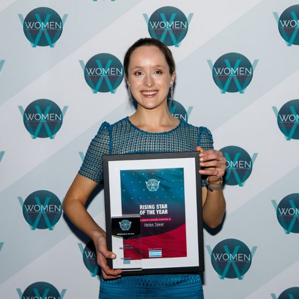 Helen Tower holding 2022 Australian Woman in Industry Rising Star of the Year Award