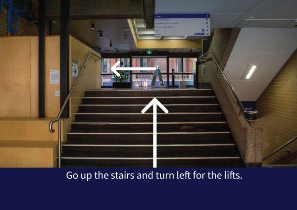Step 2: Go up the stairs and turn left for the lifts.