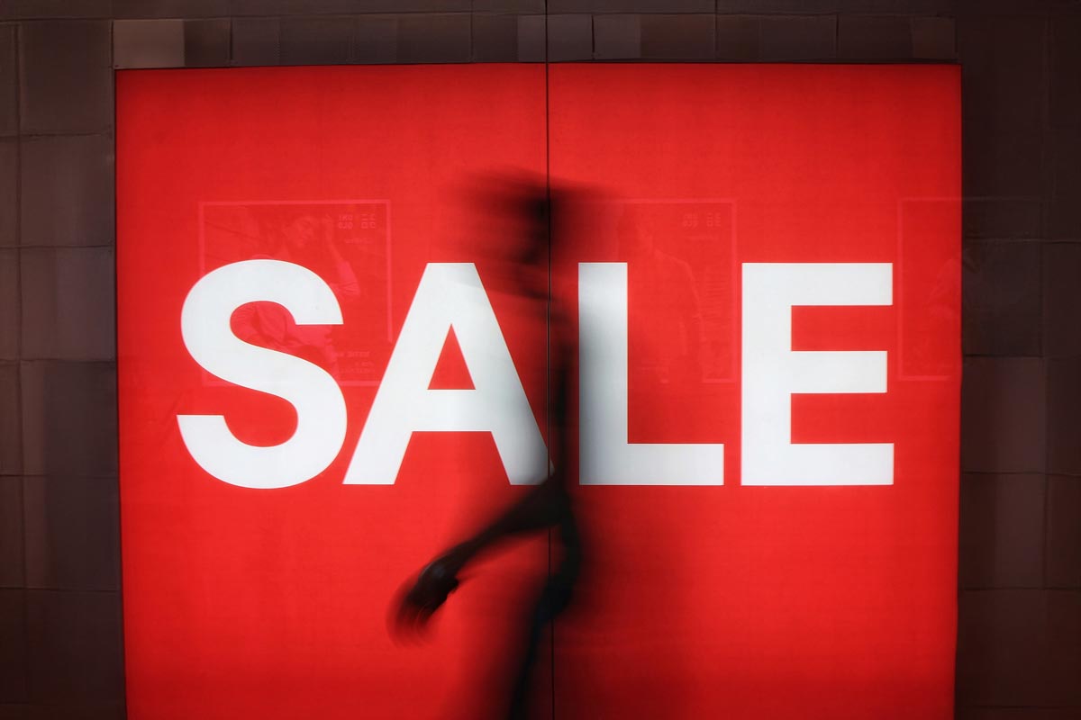 A photo of a banner saying "SALE"