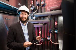 Professor Guillermo Narsilio in a geothermal plant at the farm