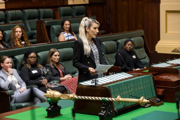 Katharine giving her stump speech in parliament.