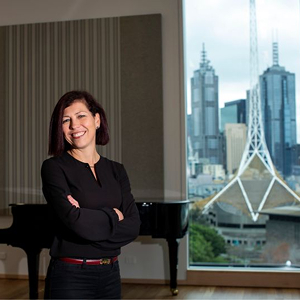Photo of Professor Felicity Baker in a corporate environment..
                                class=