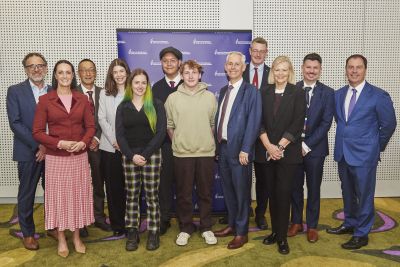 L-R: Professor Gregor Kennedy, Deputy Vice-Chancellor (Education), Sarah Witty MP, Professor Sherman Young, Pearl Goodwin-Burns, Cinder, Reggie, Kayden Andrew Giles MP, Tom Bentley Deb Tsorbaris, David Miles, Colin Brooks MP. Image: Bec Walton