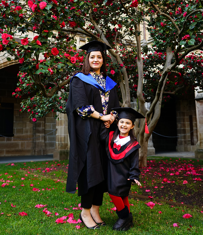 Zarqa and her daughter on graduation day.