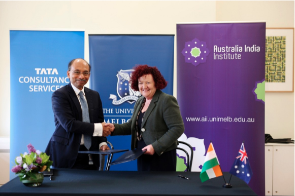 Image of TCS CTO K Ananth Krishnan and University of Melbourne Provost Margaret Sheil shaking hands.