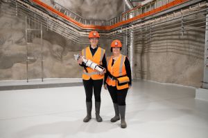 PhD student Madeleine Zurowski with lead researcher Professor Elisabetta Barberio in the Stawell Underground Physics Lab.