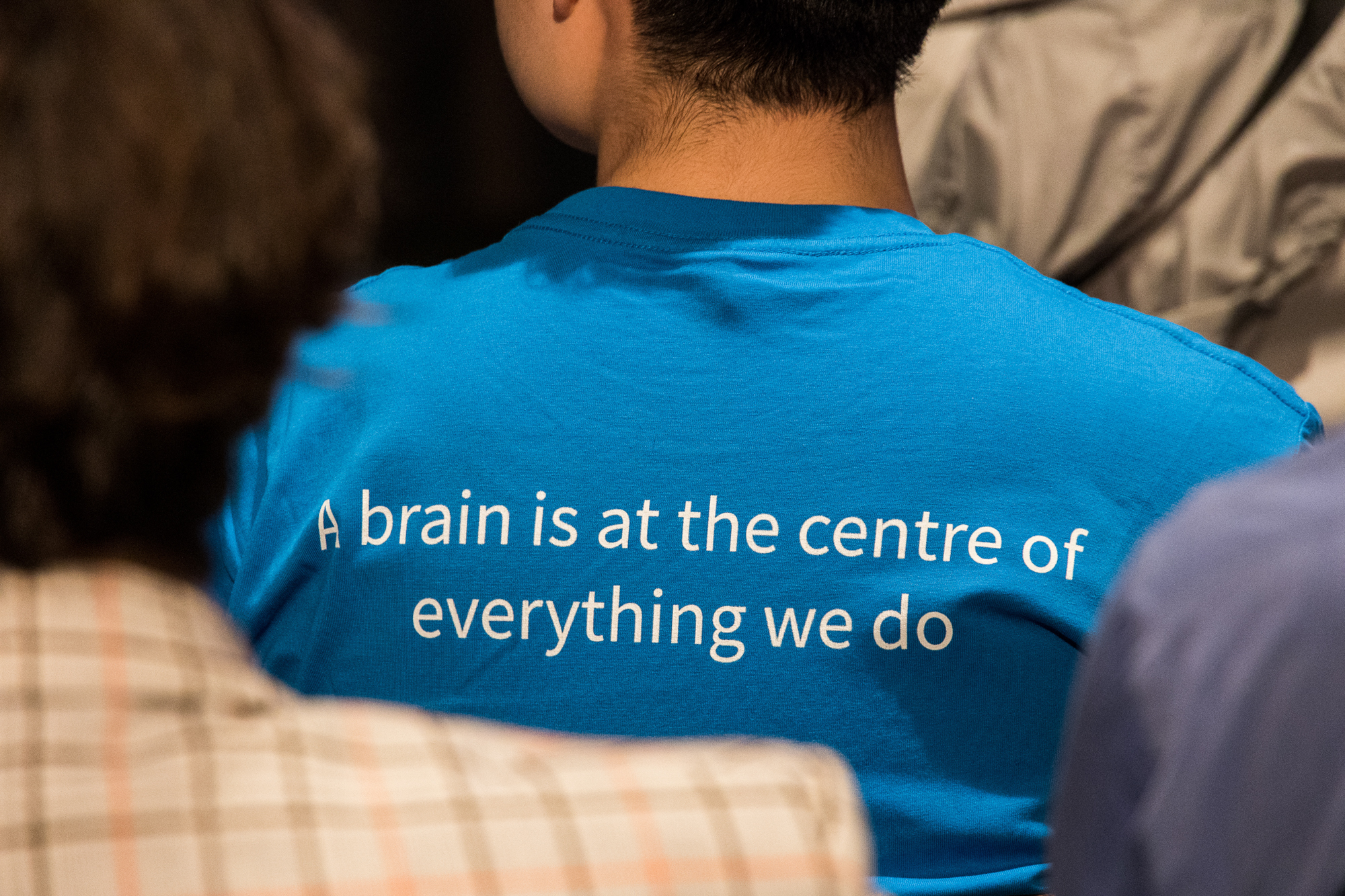 CBMM team member wearing a t-shirt with the words 