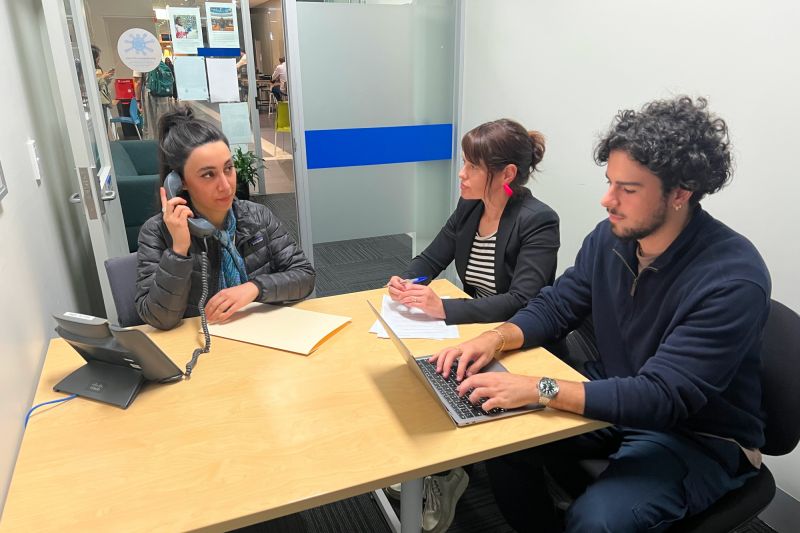 Members of the Stateless Legal Clinic call clients.