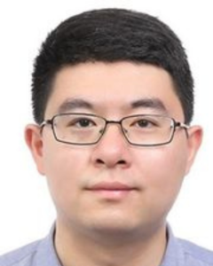 A headshot of Jin Xu.
