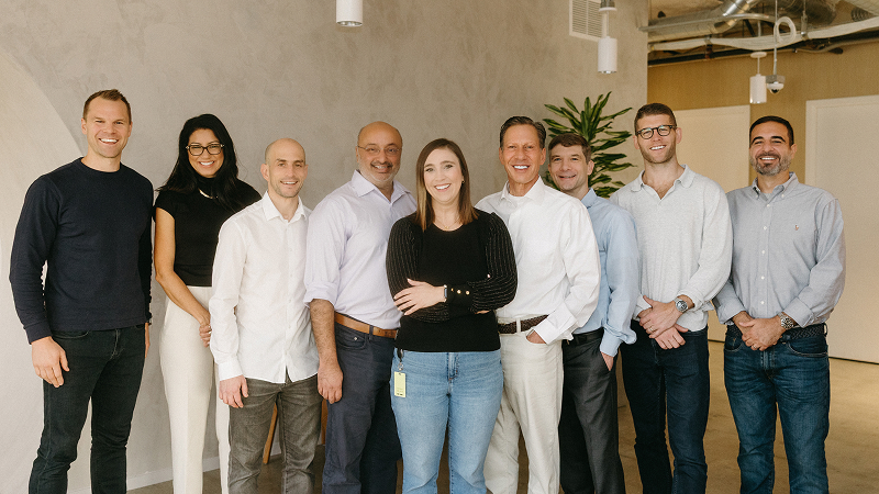 Rob (left) pictured with his executive leadership team at Credible.