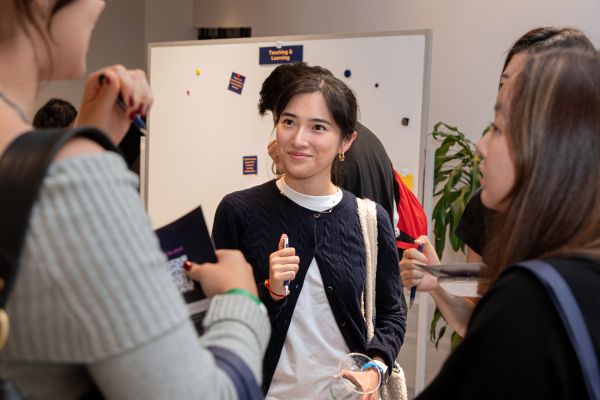 Students socialising at a MEC workshop