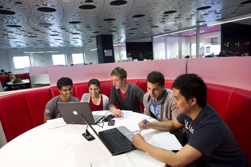 Students studying as a group in the library