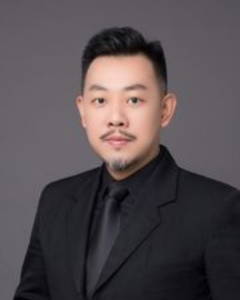 A headshot of Darrin Wong.
