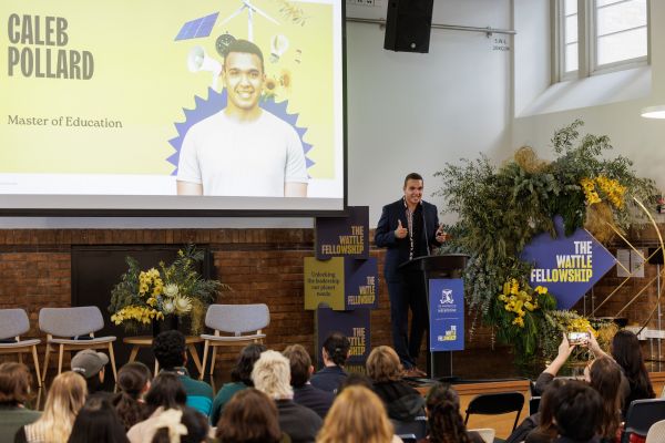 Caleb Pollard presenting at Spotlight 2025 conference. Image by James Thomas Photography (2025).