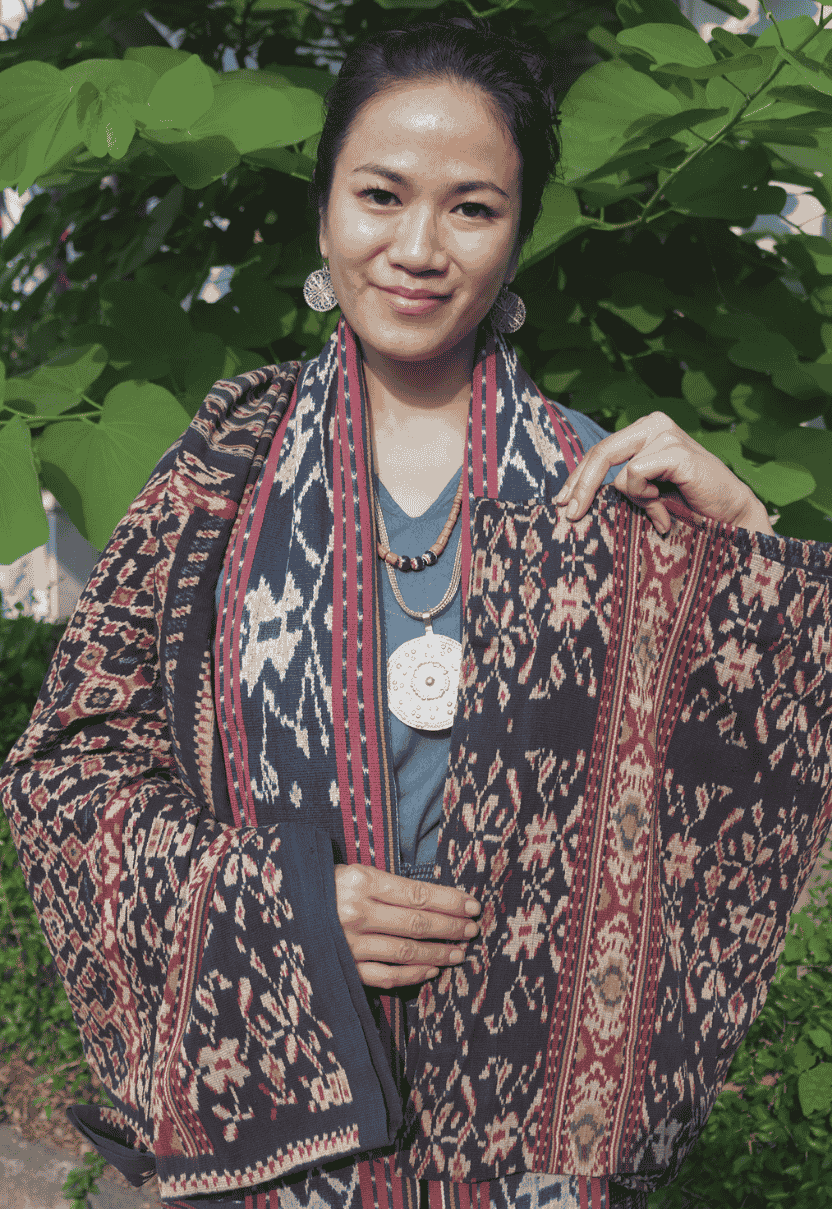 Grace Tan-Johannes wearing a Patola Ikat made by her Rotinese grandmother in the 1950s, alongside her own Sikkanese Ikat