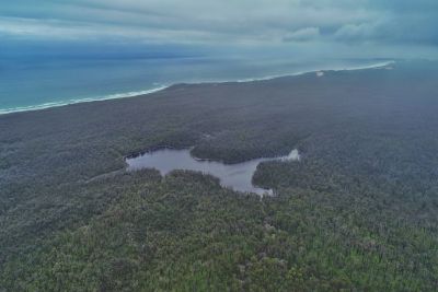 Aerial view of Purghagoolah (Lake Elusive) located within the Croajingolong National Park looking northwest. Credit: Michael-Shawn Fletcher