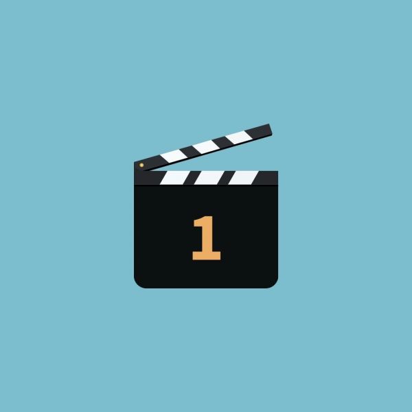 A blue with a clapboard with the number one in the middle