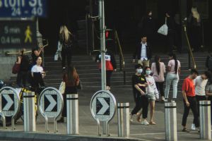 People wearing masks in Melbourne during the pandemic. Image credit: Iliya Jokic