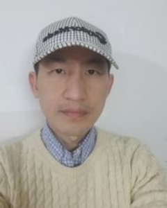 A headshot of King Zhang.