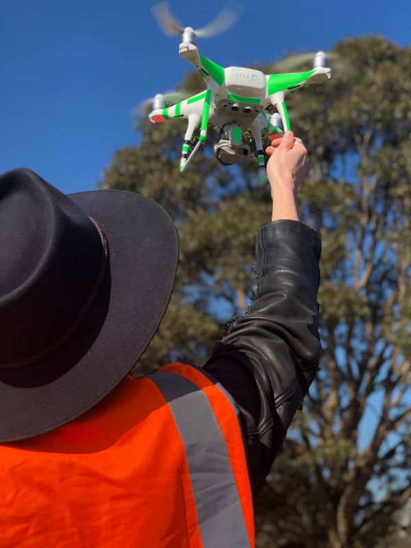 Quadcopter pilot Sascha White launches a drone