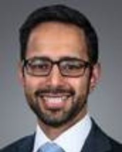 A headshot of Aditya Chibber.