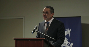 Associate Professor Joe West speaking as MC at the Return to Country Oration.