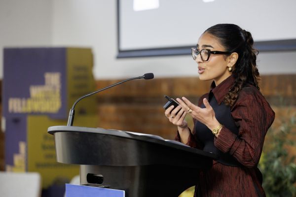 Tany Brahmanand presenting at her Spotlight event. Image by James Thomas Photography (2025).