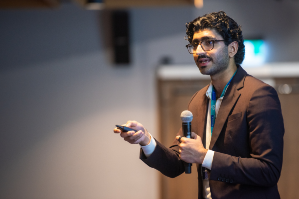 Man presenting in room