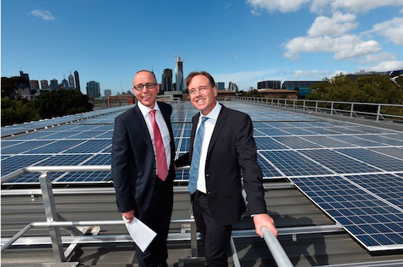 Allan Tait and Grec Hunt with solar panels