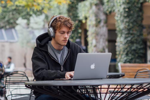 Photo of student using laptop at Parkville campus