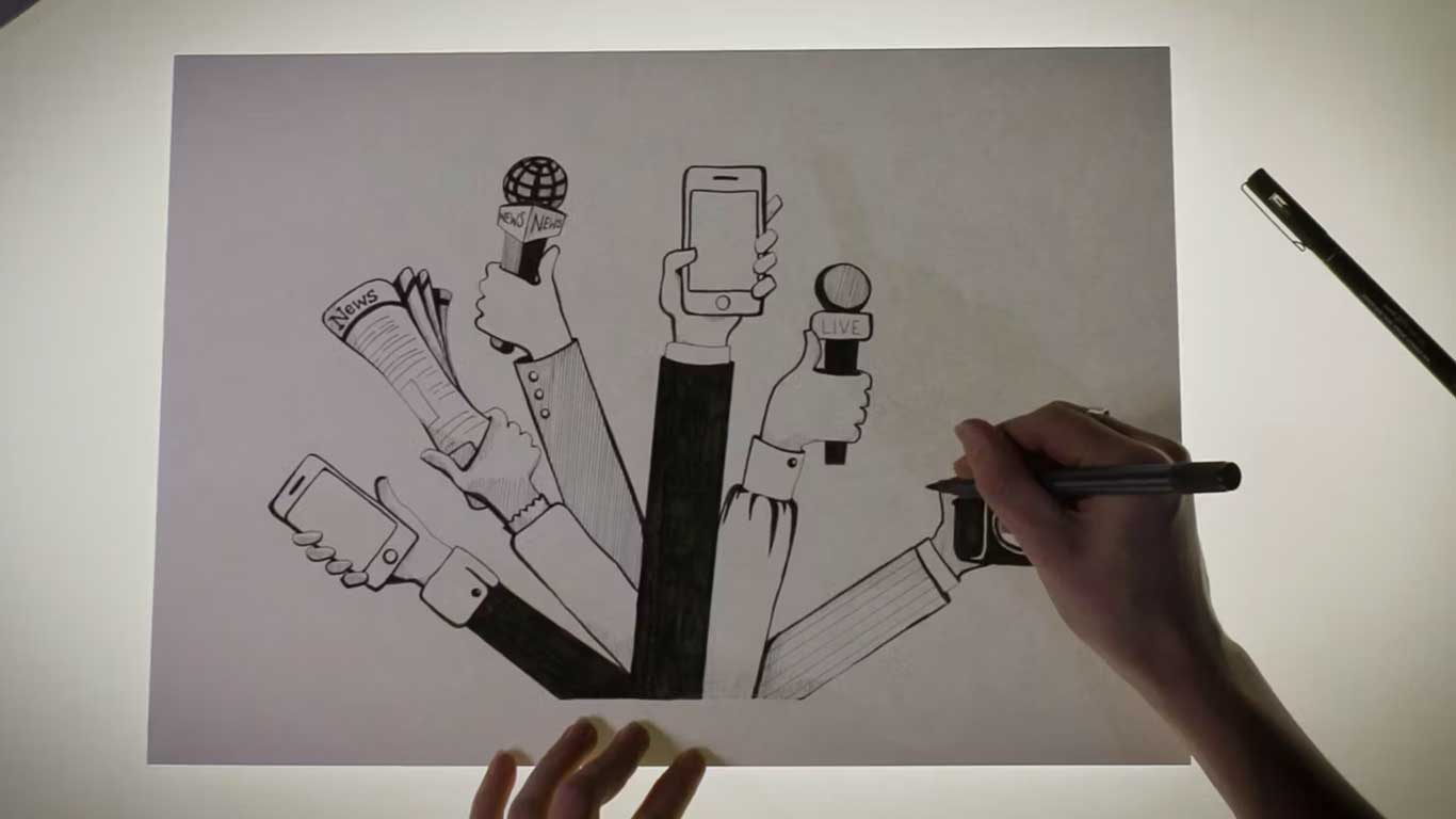 Hands drawing an illustration over a light box of hands holding devices.