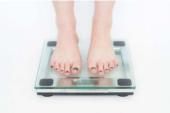 Feet on weighing scale