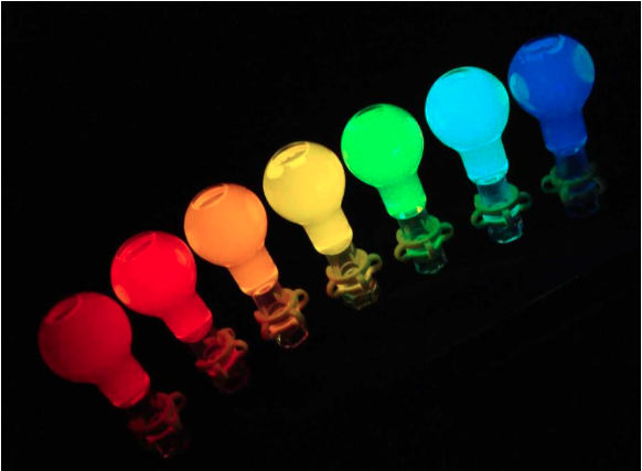 Image of light bulbs in the different hues of the rainbow.