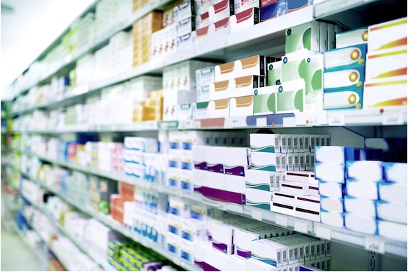 Image of shelves filled with medicines.